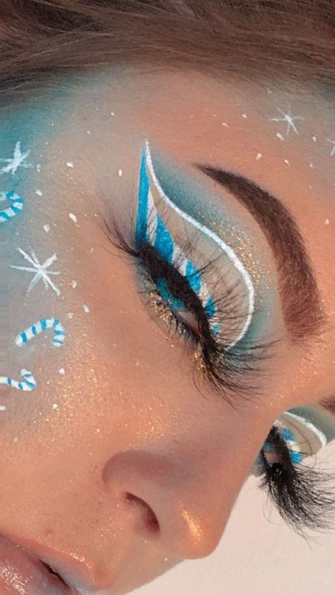 Winter Themed Makeup Looks, Blue Christmas Eye Makeup, Snowflake Graphic Liner, Blue Christmas Makeup Looks, Christmas Creative Makeup, Christmas Graphic Liner, Snowflake Eyeliner, Blue Christmas Makeup, Blue Winter Makeup