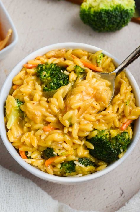 Vegan Broccoli Cheddar Orzo Broccoli Cheddar Orzo, Cheddar Orzo, Tomato Gnocchi Soup, Broccoli Orzo, Cheesy Orzo, Protein Dinners, Cheddar Sauce, Orzo Dishes, Cheddar Broccoli