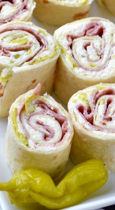 Italian Pinwheels Italian Sub Pinwheels, Low Calorie Pinwheels, Pinwheel Ideas, Pepperoni Pinwheels, Italian Pinwheels, Veggie Pinwheels, November Party, Recipes With Banana Peppers, Pinwheel Sandwiches