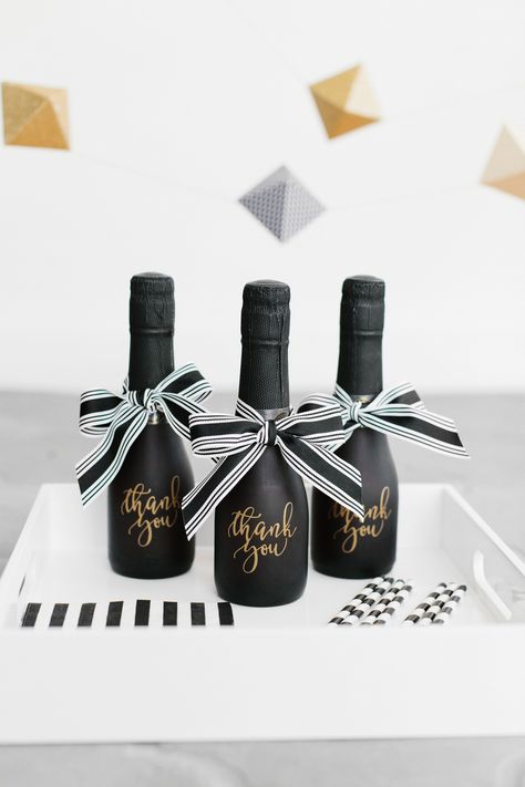 We love these Freixenet black mini bottles of champagne and have utilized them for other projects in the past. For these, we took off the labels and added our exclusive "thank you" graphic in gold vinyl. Wedding Guest Gift Bag, Diy Wedding Shoes, Homemade Wedding Decorations, Wedding Tissues, Guest Gift Bags, Wedding Hangers Personalized, Diy Wedding Ideas, Cricut Wedding, Homemade Wedding