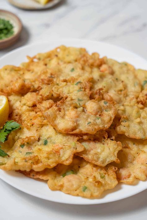 These crispy shrimp fritters from Cadiz in southern Spain are the perfect light summertime snack. Pair them with a glass of dry sherry for a real taste of Andalucia! Spanish Shrimp, Traditional Spanish Dishes, Shrimp Fritters, Frozen Cooked Shrimp, Summertime Snacks, Crispy Shrimp, Tapas Dishes, Spanish Dishes, Fritter Recipes