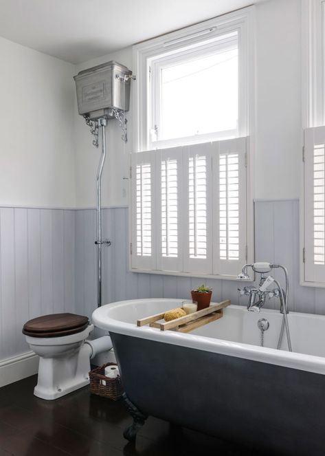 Window shutters – everything you need to know about this timeless window covering | Ideal Home Window Dressing Bathroom, Modern Bathroom Victorian House, Baths Under Windows, Cottage Window Dressing, Bath Under Window, Rolltop Bath, Bathroom Window Dressing, Bathtub Window, Window Dressing Ideas