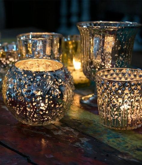 MERCURY GLASS CANDLE HOLDERS: These large rounded henna design mercury glass candle holders measure 5.75-inch diameter x 5.75 inches high. Antiqued metallic silver mercury finish, these tea light holders easily compliment virtually any color scheme.STUNNING TEA LIGHT HOLDERS: For use with tea light candles. Not food safe. Use these silver mercury glass candle holders on tables, mantles, side tables or in other decoration settings.HOME AND PARTY DECOR: Luna Bazaar's candle holders are offered in Mercury Glass Candles, Mercury Glass Candle Holders, Mercury Glass Vase, Altar Ideas, Glass Tealight Candle Holders, Mercury Glass Votives, Meditation Altar, Glass Votive Holders, Glass Votive