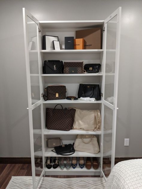 The Billy bookshelf with glass doors is perfect for displaying your purses/shoes Billy Bookcase Purse Storage, Purse Organization Ideas Bedroom, Designer Bag Display Bedroom, Purse Bookshelf, Bag Shelf Display Bedroom, Purse Shelf Ideas, How To Organize Bags, Cubicle Storage Ideas, Purse Wall Display