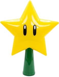 For anyone who is a fan of Nintendo and Mario Bros this is the coolest tree topper I have seen :D Funny Christmas Tree Toppers, Small Christmas Decor, Led Tree Topper, Super Mario Gifts, Mario Star, Light Up Tree, Funny Christmas Tree, Star Tree Topper, Super Star