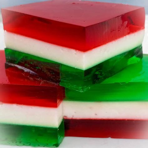 Layered Finger Jello Recipe (Layered Jello) - Amish Heritage Jello Recipes Christmas, Layered Jello Recipe, Amish Pie, Finger Jello, Holiday Finger Foods, Christmas Jello, Amish Sugar Cookies, Jello Flavors, Layered Jello