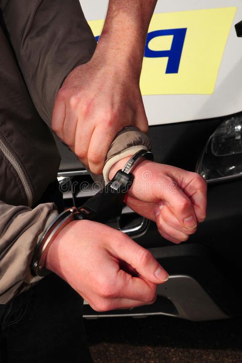 Arresting and detaining, handcuffs in action. Detail of a suspect being handcuff , #SPONSORED, #action, #Detail, #handcuffs, #Arresting, #detaining #ad Handcuffed Hands, Police Handcuffs, Police Arrest, French Bulldog Costume, Bulldog Costume, Hand Images, New Photo Download, Winter Dog, Teenage Boys