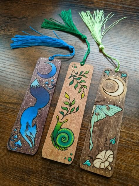 Tiny pieces based on larger pieces I've done Pyrography Home Decor, Wood Burning Tattoo Style, Wood Burn Keychain, Painted Wood Bookmarks, Wood Burning Wall Art, Wood Bookmarks Diy, Wood Burn Bookmarks, Wooden Bookmarks Diy, Woodburn Bookmarks