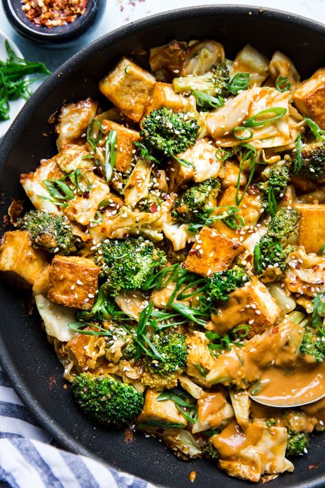 Creamy, garlicky, gingery homemade peanut sauce makes this super healthy tofu and vegetable stir-fry into a hearty, satisfying vegan dinner even omnivores will love. Sauce For Tofu, Homemade Peanut Sauce, Tofu Stir Fry, Vegan Mushroom, Mushroom Pasta, Giada De Laurentiis, Vegan Comfort Food, Pita Chips, Fried Vegetables