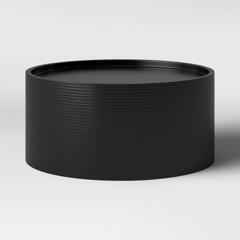 Minimal Coffee Table Black, Modern Metal Coffee Table, Black Drum Table, Mcm Glam Living Room, Black Ottoman Coffee Table, Black Round Coffee Table With Storage, Black Drum Coffee Table, Round Coffee Table Black, Black Round Coffee Table Living Room