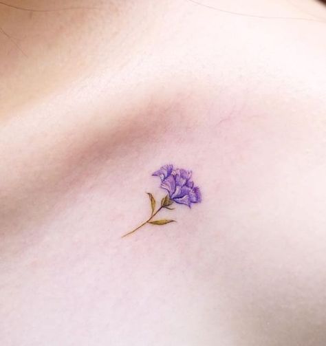 Carnation Tattoo Small Simple, Carnations Tattoo Design, Carnation Wrist Tattoo, Flower Symbolism Tattoo, Violet And Carnation Tattoo, Tiny Carnation Tattoo, Minimal Carnation Tattoo, Purple Carnation Tattoo, Carnation And Marigold Tattoo