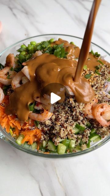 Eliya Hachem on Instagram: "Thai inspired Peanut Crunch Salad 🥗💚
 
Inspired by @healthfulradiance 

- 1 head cos (or any other greens)
- about 1 cup shredded purple cabbage (about 1/2 head)
- 3-4 large carrots shredded 
- 2-3 Lebanese cucumbers 
- 160g edamame (1 cup)
- green onion
- 1 red onion
- 1.25 cup cooked quinoa (about 230g)
- 20g crushed peanuts
- 500g cooked prawns (just cooked with a soy, lemon and chilli flakes

Dressing:
- 1/2 cup runny pb (about 150g)
- 1/4 cup low sodium soy sauce (or tamari, coconut aminos)
- 1/4 cup rice wine vinegar
- 2 tbsp sriracha
- 2 tbsp honey (about 30g)
- crushed ginger & garlic 
- chilli flakes (to taste)
- 1-2 lemons or limes (juiced)
- hot water to thin

Serves 4-6 

Macros per serve (6):
Calories: 385
Carbs: 29g
Protein: 31g
Fat: 16.5g 

#sal Peanut Crunch Salad, Peanut Crunch, Head Challenge, Crunch Salad, Cooked Quinoa, Coconut Aminos, Purple Cabbage, Week Challenge, Low Sodium Soy Sauce