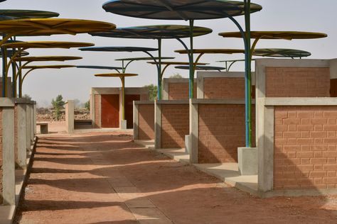 African Market, Brick Architecture, Thermal Comfort, Canopy Design, Metal Canopy, Abstract Geometric Art, Brick Facade, Contemporary Living Spaces, Ground Floor Plan