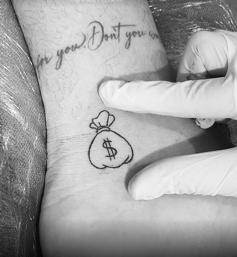 Cute Money Tattoo, Money Bag Finger Tattoo, Bag Of Money Tattoo, Money Heart Tattoo, Small Money Bag Tattoo, Money Tattoo Ideas For Women, Small Money Tattoo, Money Bag Tattoo Design, Time Is Money Tattoo