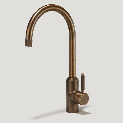 Finally, the perfect kitchen mixer tap to match your cabinet hardware is here. Introducing our Kitchen Taps collection, available in two contemporary silhouettes. PORTMAN is the taller, more elegant style of the two, with a beautifully curved swan neck that sits proudly upon kitchen worktops. If you have a spacious kitchen with a sink overlooking a window view, or sat centrally on a kitchen island, PORTMAN is the tap for you.Choose from our core range of hardware finishes; Brass and Antique Brass. Complement your PORTMAN kitchen mixer tap with your cabinet hardware, or choose a contrasting finish — that's pretty on trend right now, we hear. Better still, select textured spout and handle details that marry-up with your textured hardware. Whether knurled, swirled, grooved or smooth, these di Kitchen Taps And Sinks, Brass Kitchen Hardware, Brass Kitchen Tap, Closet Bar, Interior Layout, Spacious Kitchen, Brass Tap, The Perfect Kitchen, Threaded Rods