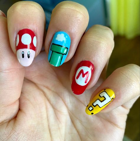 #marionails #marionailart #mysterybox #mario #mushroom #nailart #nails #nailsofinstagram #gelnails Mario Brother Nails, Mario Bro Nails, Super Mario Bros Nail Art, Video Game Nail Designs, Mario Cart Nails, Lego Nail Art, Super Mario Nails Art, Mario Brothers Nails, Mario Inspired Nails