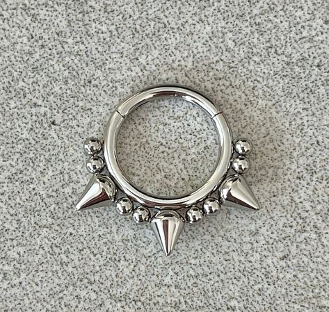 "This septum piercing is made of high quality surgical steel. Piercing \"clicks\" into place. Drop jaws with this body jewelry! Also available in gold and black. Details & Size: ♥ 316L Surgical Steel ♥ 16G, available in 8mm or 10mm size ♥ Every purchase comes with an Elara gift box Please message me if you have any questions" Alt Septum Jewelry, Septum Peicerings, Septum Jewelry Men, Septum Piercing Cute, Cool Septum Jewelry, Bijoux Piercing Septum, Cute Septum Rings, Cartilage Piercing Hoop, Conch Ring