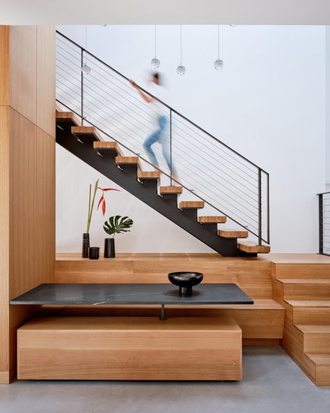 A Dining Area Was Included In The Design Of These Stairs Built In Stairs, Wood Slat Railing, Bench Under Stairs, Kitchen Under Stairs, Open Stairs, Open Staircase, Floating Stairs, Bright Living Room, Table Bench