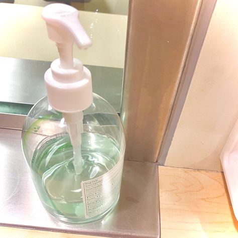 a bottle of greenish-blue hand sanitizer with a white pump nozzle sitting on a desk Sterile Aesthetic, Hospitalcore Aesthetic, Clean Core, Golden City, Aesthetic Gif, Disease, Snow White, Quick Saves, White