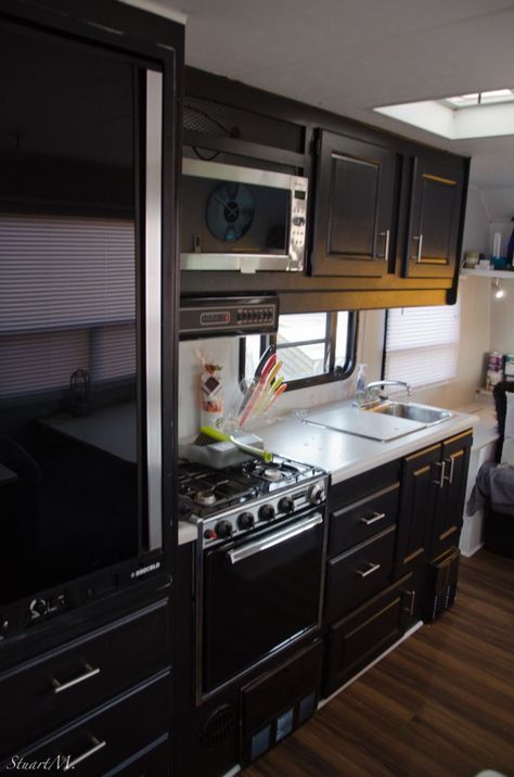 Black RV Kitchen Sunset Vacation, Mountains Beautiful, White Cupboards, Camper Kitchen, Nice Kitchen, Diy Camper Remodel, Trailer Living, Rv Kitchen, Travel Trailer Remodel