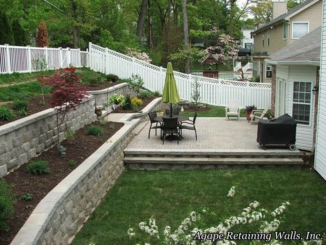 Slanted Backyard, Backyard Oasis Landscaping, Terraced Yard, Backyard Retaining Walls, Slope Landscaping, Backyard Decorations, Retaining Wall Ideas, Deck Fireplace, Sloped Backyard Landscaping