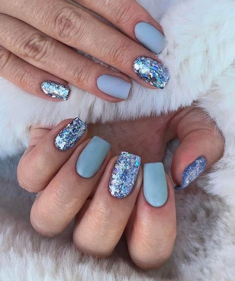 🌨️ Let your nails dance in the winter wonderland with these captivating nail art designs. Embrace the season's charm with snowflakes, glitter, and icy hues. Elevate your style and let your nails tell a frosty tale! #WinterNailArt #SnowflakeNails #SeasonalManicure