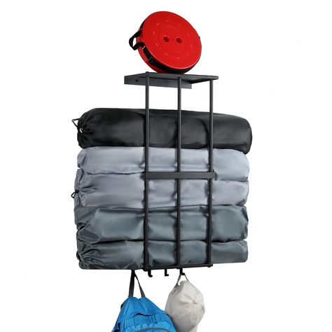 PRICES MAY VARY. metal Widely Applicable Space Saving ：The wall mounted garage storage is designed to make full use of unused wall space. It can be used to organize camping chairs, tents, umbrellas, yoga mats,etc. There are 4 hooks at the bottom to conveniently hang hiking bags, hammock bags, ropes, etc. The shelf at the top can create extra storage space to store small items. Widely used in garages, basements, storage rooms, gyms, or bathrooms by improving space utilization and making it look c Camp Chair Storage, Small Garage Organization, Garage Storage Inspiration, Garage Storage Racks, Small Garage, Camping Storage, Camping Beach, Beach Chair Umbrella, Garage Shelving