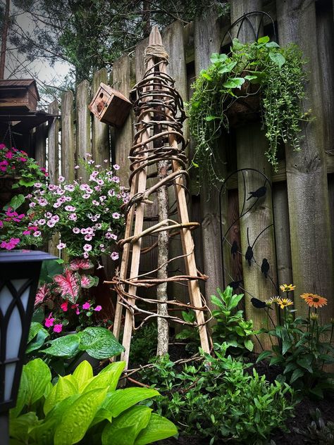 Knoxville Area Gardening Tips | I made a rustic garden obelisk yesterday out of tobacco stakes & wisteria vine Garden Supports, Garden Obelisk, Diy Metal, French Garden, Rustic Gardens, Diy Garden Projects, Wisteria, Solar Lights, Diy Garden