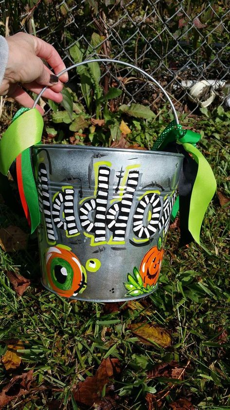 8.5 Big Round Pail Personalized Hand Painted Halloween Bucket | Etsy Diy Halloween Buckets For Kids, Painted Halloween Buckets, Tin Bucket Ideas, Metal Tin Bucket Ideas, Halloween Buckets For Kids, Diy Halloween Buckets, Painted Metal Buckets, Painted Buckets, Hand Painted Halloween