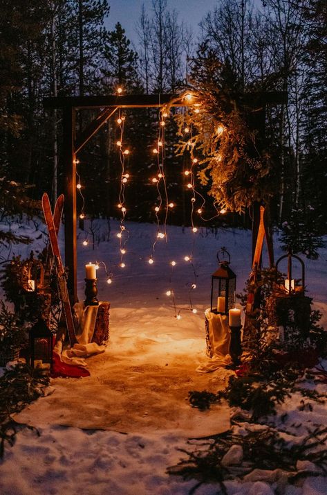 Twinkling fairy lights dance among evergreen foliage, casting a spell of romance and celebration. From cozy blankets to glistening snowflakes, step into a winter wonderland of love and enchantment with this breathtaking wedding decor! ❄✨💙 #winterweddingdecor #weddingdecorinspo #winterwedding Winter Wonderland Garden, Yule Themed Wedding, Small Cozy Wedding, Winter Wonderland Proposal, Budget Winter Wedding, Wedding Inspo Winter, Winter Dance Decor, Winter Woods Wedding, Cozy Winter Wedding Aesthetic