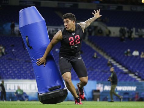 Utah defensive lineman Bradlee Anae runs a drill at the NFL football scouting combine in Indianapolis, Saturday, Feb. 29, 2020. (AP Photo/Michael Conroy) | AP    Utes, Aggies represented at pre-draft gathering. It was a busy Saturday for the Utah Utes at the NFL Scouting Combine at Lucas Oil Stadium in Indianapolis.  Defensive end Bradlee Anae and linebacker Francis Bernard joined defensive tackles Leki Fotu and John Penisini as participants. Utah State linebacker David Woodward was also evaluat Nfl Combine, Best Nfl Catches, Defensive Lineman, Lucas Oil Stadium, Utah Utes, Defensive Back, Utah State, Bench Press, Running Back