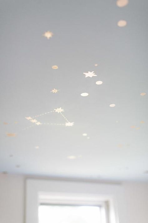 Transitional nursery with Behr Rainwashed painted ceiling featuring a DIY galaxy ceiling. Starry Nursery, Galaxy Ceiling, Constellation Nursery, Galaxy Nursery, Transitional Nursery, Star Themed Nursery, Starry Ceiling, Sky Nursery, Nursery Diy