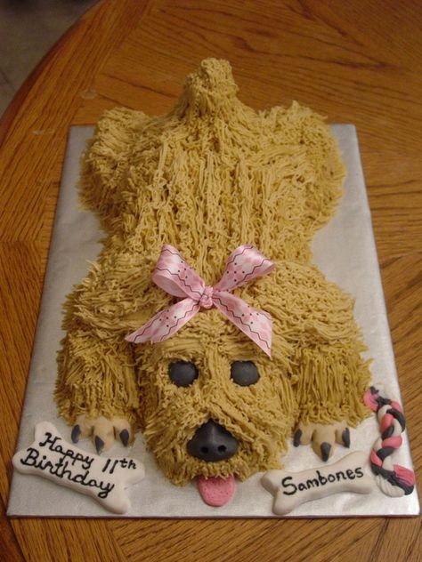 Thanks to a fellow CC member for the design idea! All buttercream, and cut, stacked, and carved from a 9x13 cake. Fondant bones, facial features, paws, and chew toy. This was a lot of fun!! Dog Bone Shaped Cake, Puppy Shaped Birthday Cake, Dog Birthday Cake Icing, Cake Decorated Like A Dog, Puppy Cakes, Gum Recipe, Cake Shaped Like Dog, 9x13 Cake, Puppy Dog Cakes