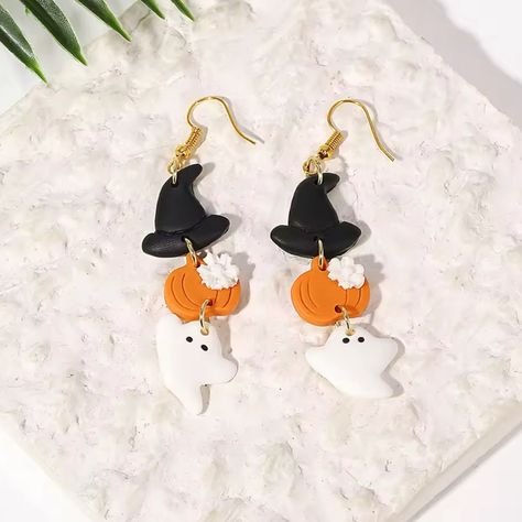 Spooky Season Could Get Better With These Black, Orange And White Earrings Featuring Clay Handcrafted Witch Hat, Pumpkin And Ghost! Bundle And Save With Other Fun Items In Our Closet Order Includes 1 Pair. Similar To Baublebar***** These Are Not Baublebar Bundle Closet Items 2 For $25 Pumpkin Earrings Clay, Pumpkin And Ghost, Autumn Earrings, Halloween Clay, Clay Dangle Earrings, Play Clay, Pumpkin Earrings, Halloween Earrings, Cute Room Decor