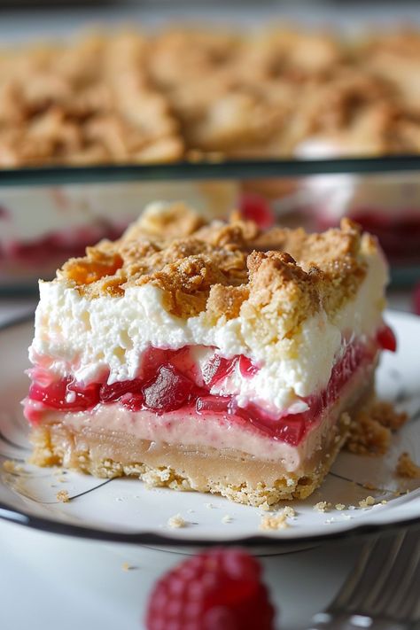 Rhubarb Pudding Bars: A Springtime Delight Layered Rhubarb Pudding Dessert, Rhubarb Pudding Bars, Rhubarb Delight Recipe, Graham Wafer Crust, Pudding Bars, Pudding Bar, Rhubarb Pudding, Rhubarb Bars, Rhubarb Cobbler