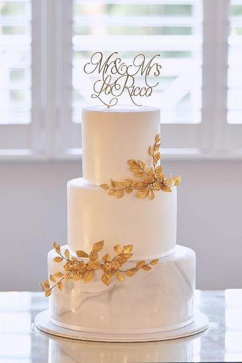 Wedding Cake Ideas Elegant Gold, White And Gold Wedding Cake Simple, 2 Tier Wedding Cakes Simple Elegant Gold, Champagne Gold Wedding Cake, Wedding Cakes White And Gold, White And Gold Cake Wedding, Gold Wedding Cake Designs, Wedding Cake 3 Tier Elegant, Wedding Cake Designs Elegant Gold