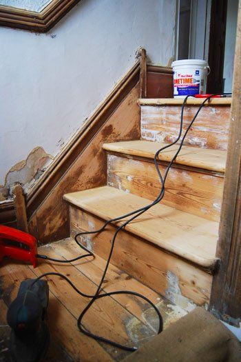 One Year Later: What Our Painted & Stained Staircase Looks Like Now Painting Wooden Stairs, Staining Stairs, Stained Staircase, Stairs Nook, Wood Banister, Victorian Stairs, Stairs Skirting, Painted Staircase, Under Stairs Nook