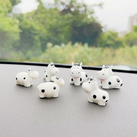 PRICES MAY VARY. 🐮【Not Only a Car Decoration】They are not only a funny car accessories, our car rearview mirror ornament can also be used as a mini figurines, cake toppers, micro landscape decor, party decorations, home decor, yard decor etc. Additionally this car charm can taped to your laptop, photo frames, motorcycle or anywhere you like. 🐮【Premium Quality】Our cartoon cows aesthetic car dashboard accessories are made of high-quality resin materials, these car dashboard decor fwon't fade ove Cow Print Car Interior, Cow Print Car Decor, Cows Aesthetic, Cow Car Decor, Cow Steering Wheel Cover, Dashboard Decorations, Dashboard Accessories, Cartoon Cows, Car Dashboard Accessories