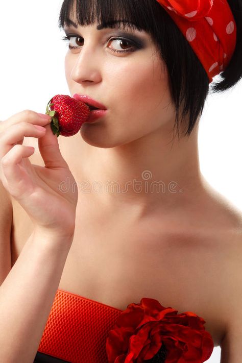 Woman holding a red strawberry stock photos Holding Strawberry Reference, Strawberry Reference Photo, Eating Strawberry Pose, Woman Eating Strawberry, Holding Strawberry, Stock Photos Woman, People Poses, Portfolio Ideas, Anatomy Poses