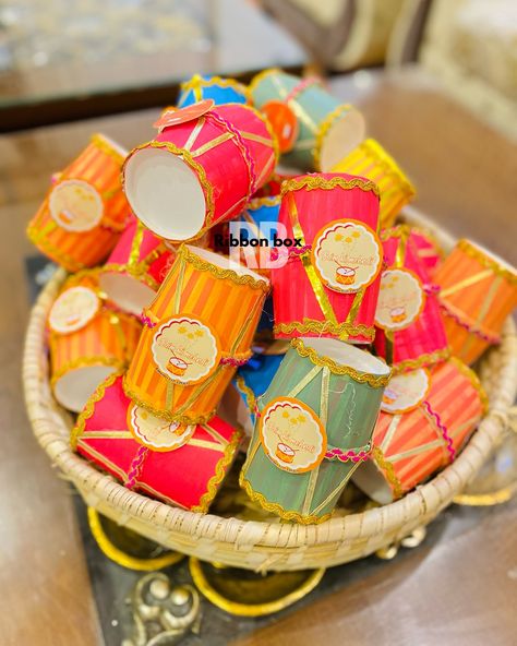 CUSTOMIZE FILLED DHOLAK FAVORS✨💌 Dholak Favors, Wedding Favors, explore page, Explore more #weddingfavors #explorepage #weddinginspiration #weddingideas #dholakfavors #pakistaniwedding #nikkahfavours #shadi #explorepage #exploremore Desi Wedding Favors, Dholki Favors, Dholki Decoration, Wedding Card Frames, Creative Wedding Gifts, Terrace Garden Design, Favors Wedding, Desi Wedding, Creative Wedding