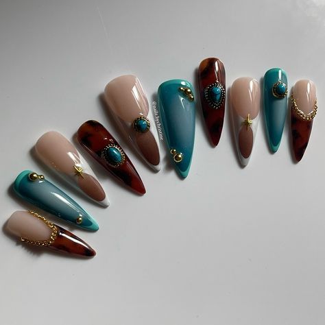 Gel-X Long Stiletto Press ons Animal print charms aura nails gold   Who knew tortie + turquoise would be a match made in heaven? 🩵 Raw photos no edits 😼 • ib// @miranaildit • • @apresnailofficial Long Stiletto Gel-X • @mostive Real Series (colours are listed under my reels post) • @lunabeauty_store dGEL Signature Fit No Wipe Topcoat and Jin.B GRACIA Crazy Top Thick to secure charms (DC:CHRISTINE10) • • • Dm orders are open only for Australian customers. Prices range from $110 AUD. #nailinspo #nailart #gelxnails #nailitdaily #stilettonails #melbournenailte... Gold Turquoise Nails, Turquoise And Brown Nails, Dc Nails, Zebra Print Nails, Nailinspo Nailart, Dragon Nails, Aura Nails, Turquoise Nails, Long Stiletto