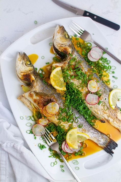 Top view of roasted branzino with scallion topping. Roasted Branzino, Ponzu Sauce Recipe, Branzino Recipe, Ponzu Sauce, Main Course Recipes, Oven Cooking, Large Plates, Easy Delicious, Seafood Dishes