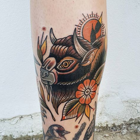 Bison head tattoo inked on a calf by @rabtattoo Bison Tattoo Traditional, Bison Head Tattoo, Traditional Buffalo Tattoo, Buffalo Head Tattoo, Bison Tattoo Ideas, Bison Tattoo, Buffalo Tattoo, Bison Head, Cage Tattoos