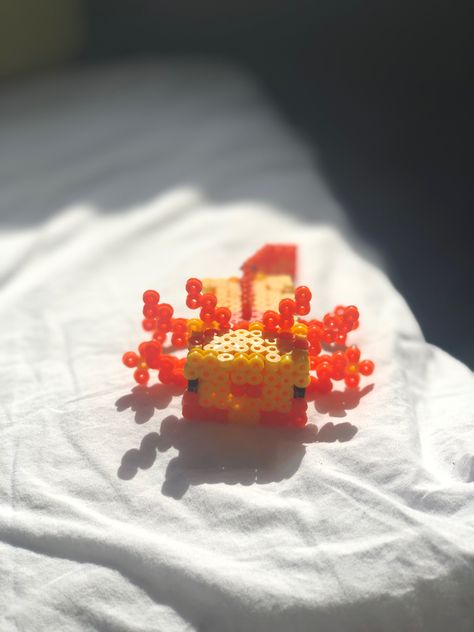 Perler bead minecraft axolotl - Materials: Perler beads and acrylic rods/toothpick to hold axolotl together. I used sewing thread to make the legs and tail wiggly :D Credits to QDCrafts on Youtube! Instructions: https://youtu.be/hKEYiVuEBvE Perler Axolotl, Minecraft Axolotl Perler Beads, Axolotl Perler Beads, Axolotl Pixel Art, Perler Bead Minecraft, Figure Tutorial, Minecraft Axolotl, Mini Hama Beads, Acrylic Rod