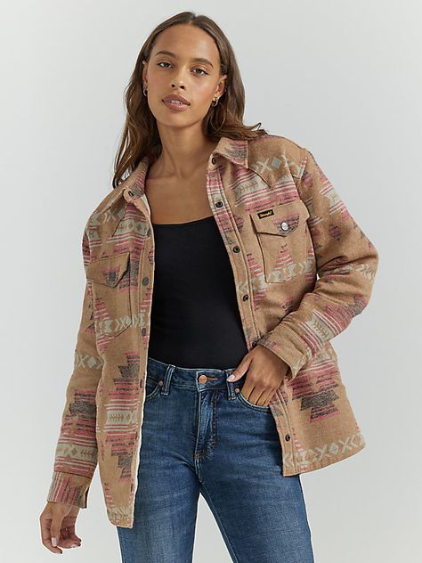 SOON TO BECOME YOUR GO-TO When your signature denim deserves a break, the Women's Wrangler Retro® Southwestern Print Shacket can do no wrong. It's crafted from 100% cotton jacquard fabric with a printed Western-inspired pattern. This women's shirt jacket comes with pointed yokes, a longline silhouette, a full snap closure, and two chest flap pockets with the signature "W" stitching. Western Shacket, Southwestern Jacket, Children Bottoms, Quilted Sleeves, Southwestern Print, Retro Jacket, Long Sleeve Kids, Aztec Pattern, Jacquard Fabric