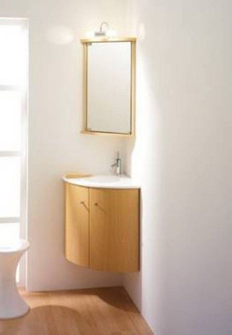 20 Beautiful Corner Vanity Designs For Your Bathroom - Housely Corner Sink Mirror Ideas, Mirror For Corner Sink, Small Corner Vanity Bathroom, Tiny Corner Bathroom, Corner Bathroom Sink Ideas, Corner Mirror Bathroom, Bathroom Corner Mirror, Corner Bathroom Vanity Ideas, Corner Sink Vanity