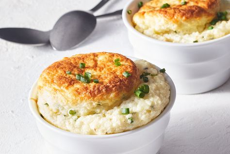 Great recipes can make cooking feel like magic. Think about it: You can mix up everyday ingredients like milk, grits, eggs, and cheese, place them in the oven, and then out comes a voluminous soufflé. It’s witchcraft of the best kind. This recipe makes eight individual soufflés that taste like the lovechild of spoonbread silky grits. Served with bacon, these soufflés are perfect for a brunch, or serve them as the side dish for an elegant dinner party, perhaps with slow-braised lamb and roasted a Goat Cheese Grits, Grits Souffle, Cheese Grits Souffle, How To Cook Grits, Grits Recipe, Cheese Grits, Braised Lamb, Quick Cooking, Grits