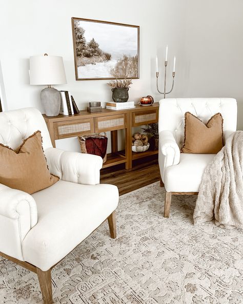 Before moving this dresser into our entryway hallway, I styled it in the front foyer. I loved the simplicity and serenity of the Neutral tones and natural textures create a calming entryway that invites warmth and peace from the moment you step inside. 🌟The first two pictures are what I styled before I decided to switch up the living room. The last three are what I ended up doing. 🤔What are your thoughts? Do you like the final result? Which one is your favorite? #HomeDecorInspo #Neutral... Subtle Disney Living Room, Entryway With Chair Ideas, Neutral Foyer Entryway, Foyer Living Room Combo, Entry Way Sitting Area Entrance, Entry Way Seating Area Entrance, Foyer Sitting Area Entryway, Walk Into Living Room From Front Door, Small Living Room Entryway