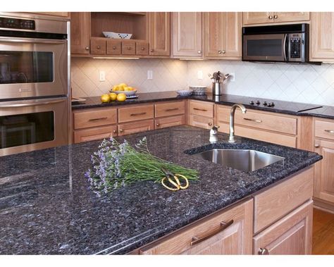 Choosing the Right Granite Countertop Color for Your Kitchen Remodel Dark Granite Kitchen, Cheap Granite Countertops, Blue Kitchen Countertops, Countertops And Backsplash Ideas, Pearl Granite Countertops, Blue Granite Countertops, Black Pearl Granite, Black Granite Kitchen, Blue Pearl Granite