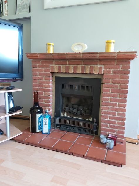 Old brick fireplace and defunct gas fire.  Terracotta tile hearth. Brick And Tile Fireplace, Old Brick Fireplace, Tile Hearth, Brick Fireplaces, Brick Fireplace Makeover, Terracotta Tile, Room Fireplace, Old Bricks, Gas Fire